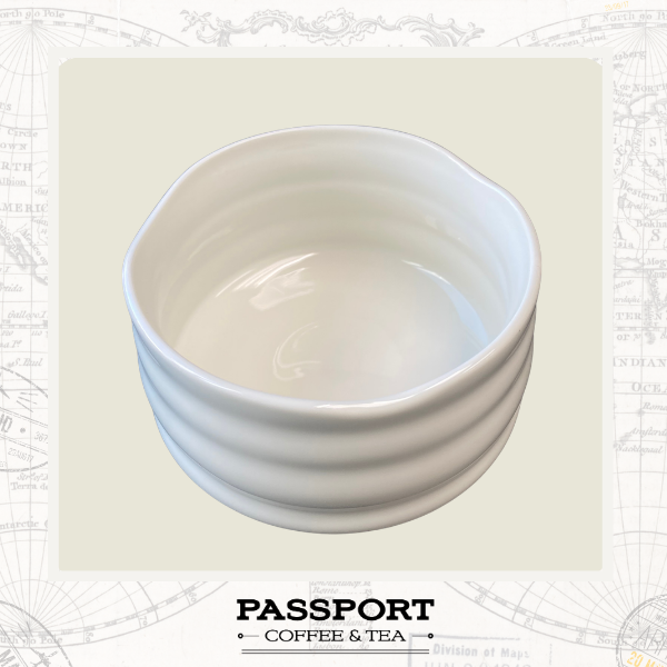 MATCHA BOWL- A white ceramic cup with a wavy rim and horizontal ridges