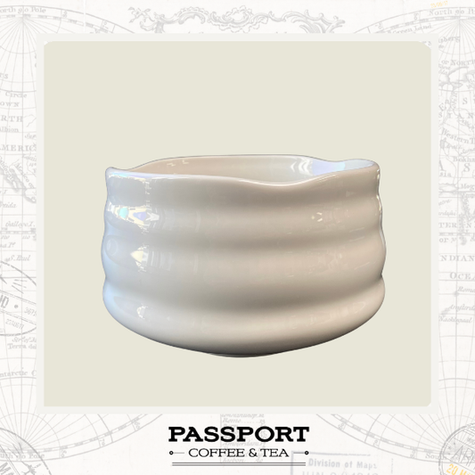 MATCHA BOWL- A glossy white ceramic cup with a wavy rim and horizontal ridges