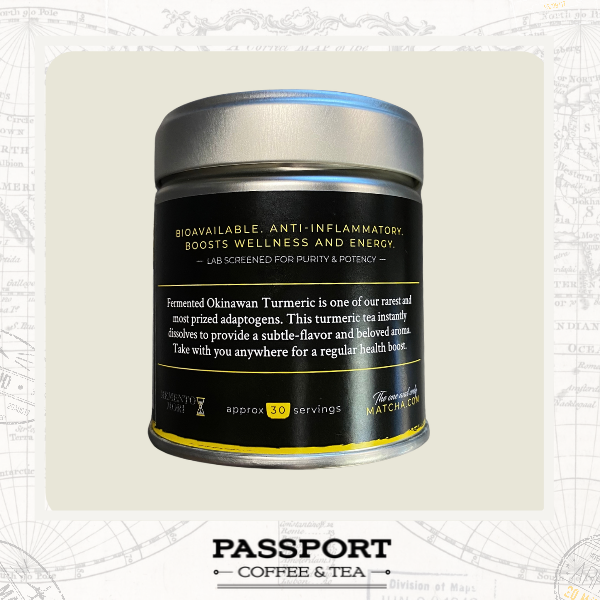 A cylindrical black and silver tin of Passport Coffee & Tea Terroformed Okinawan Turmeric, set against a light beige background with a faint map pattern and a white border.